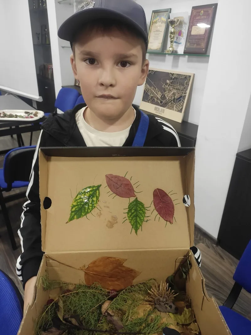 A participant of the session with his work
