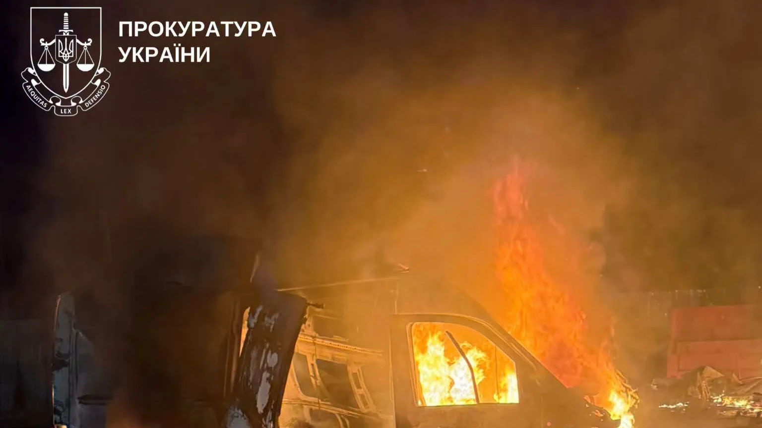 A vehicle that caught fire at the market after the strike
