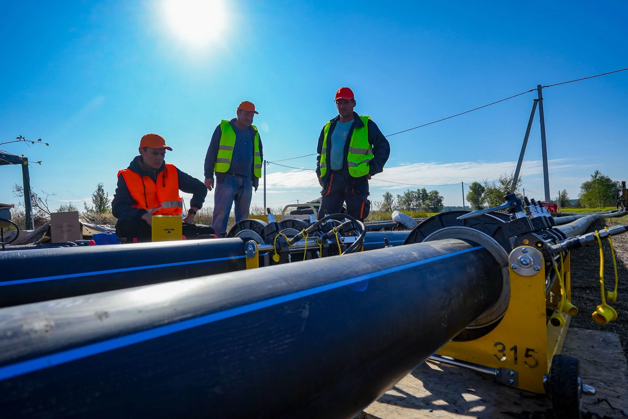 Workers welding pipes for the “Great Water Main”
