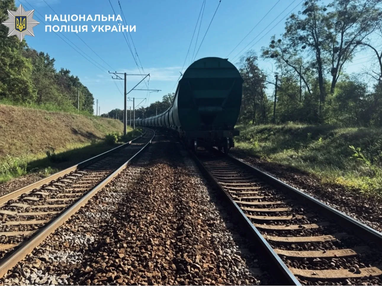 A freight train on the tracks near the Sklozavodska platform in Bucha, 28 September