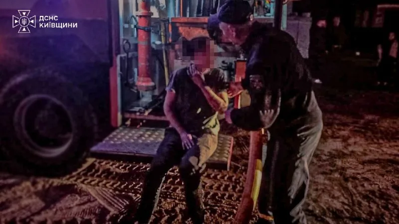 A rescuer helping an injured man