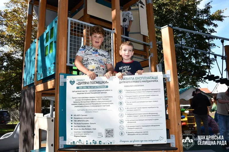 The Children’s Smiles project sign listing its partners
