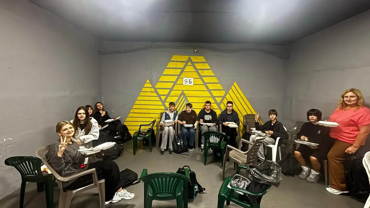Pupils in the shelter of a school in the Bucha community