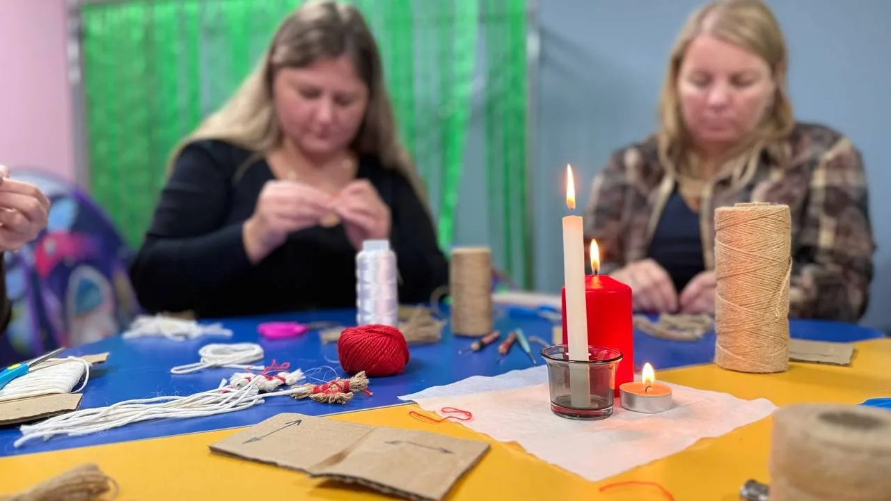 Teachers of the Ruta kindergarten making the amulets