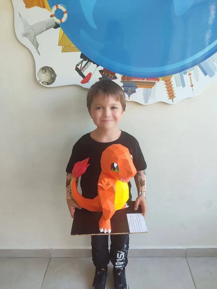 Myroslav Kolisnichenko with his paper Pokémon