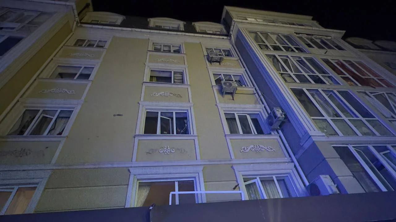 An apartment block with blown-out windows in Sofiivska Borshchahivka