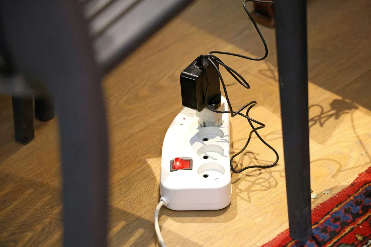 A power strip with an appliance plugged in. Illustrative photo