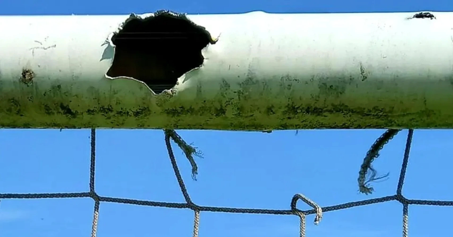 Crossbar pierced by shrapnel