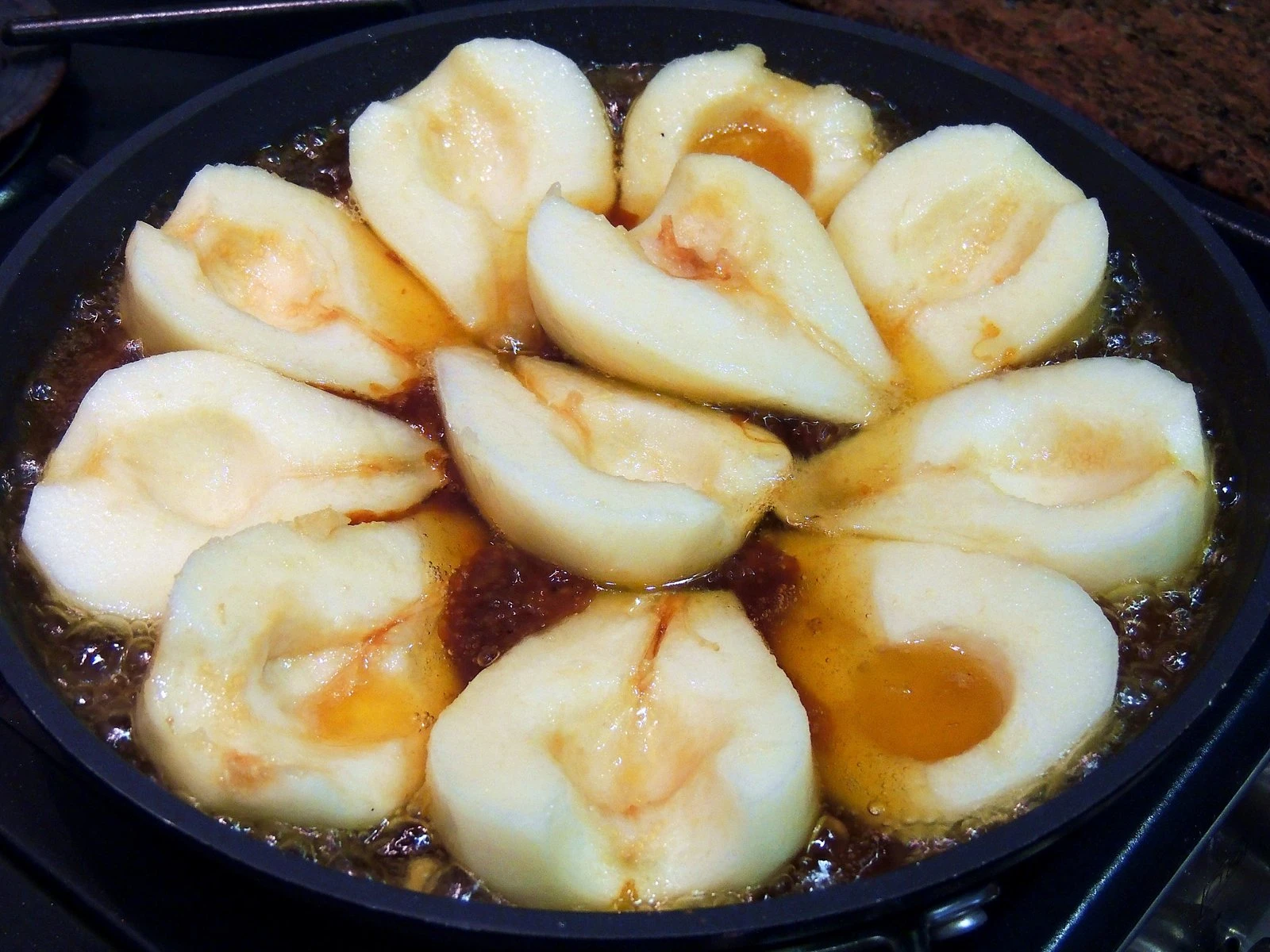The pears go into the caramel