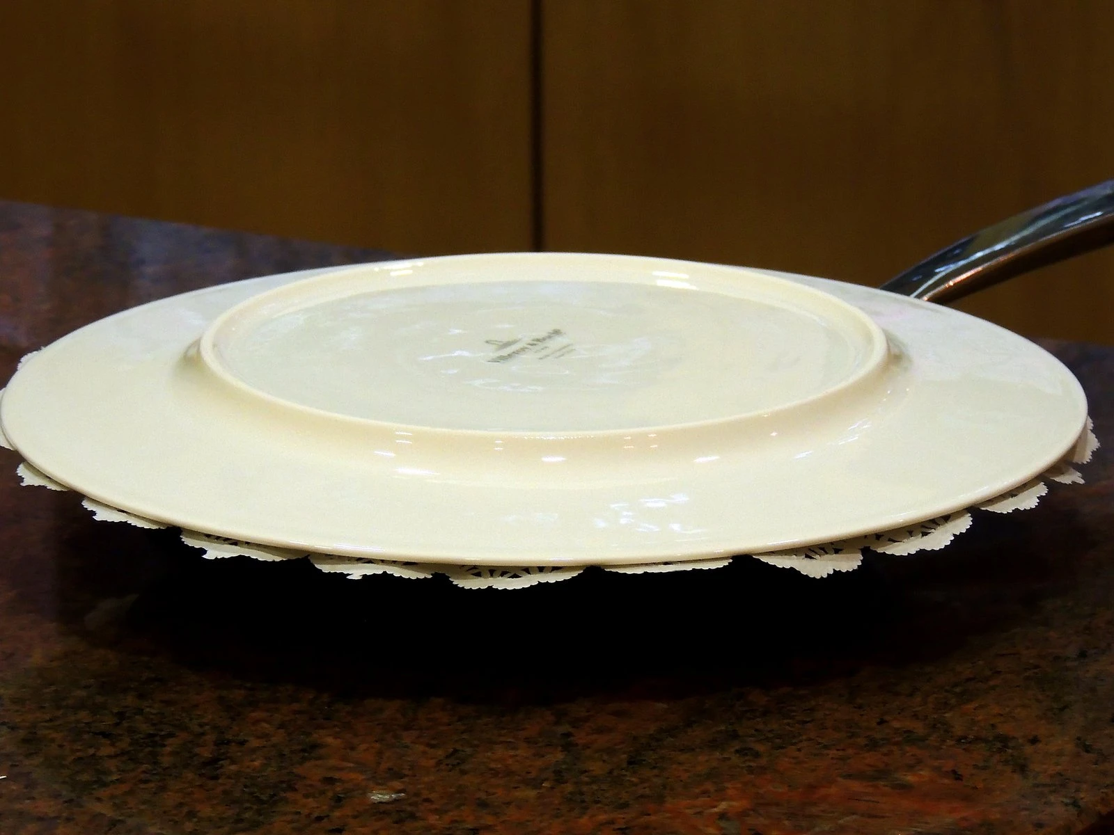 A plate goes over the pan to turn out the pie