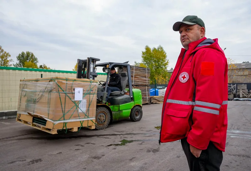 Pallets of equipment being unloaded by forklift